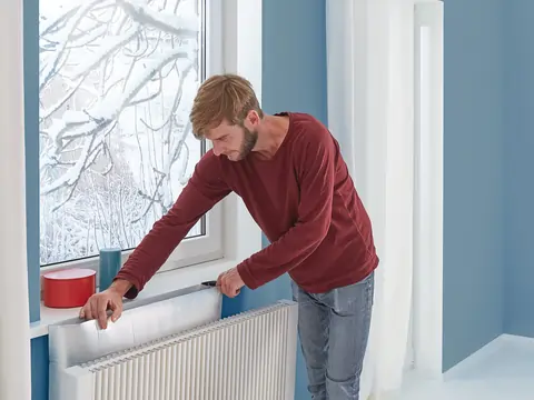 Plaatsen van radiatorfolie